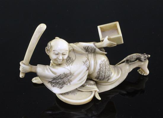 A Japanese ivory okimono of a ratcatcher, Meiji period, 8.5cm